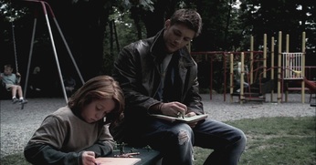 Dean and Lucas draw in the park